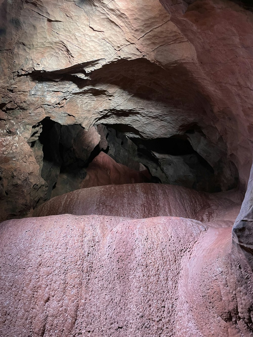 a rock formation with a hole in it