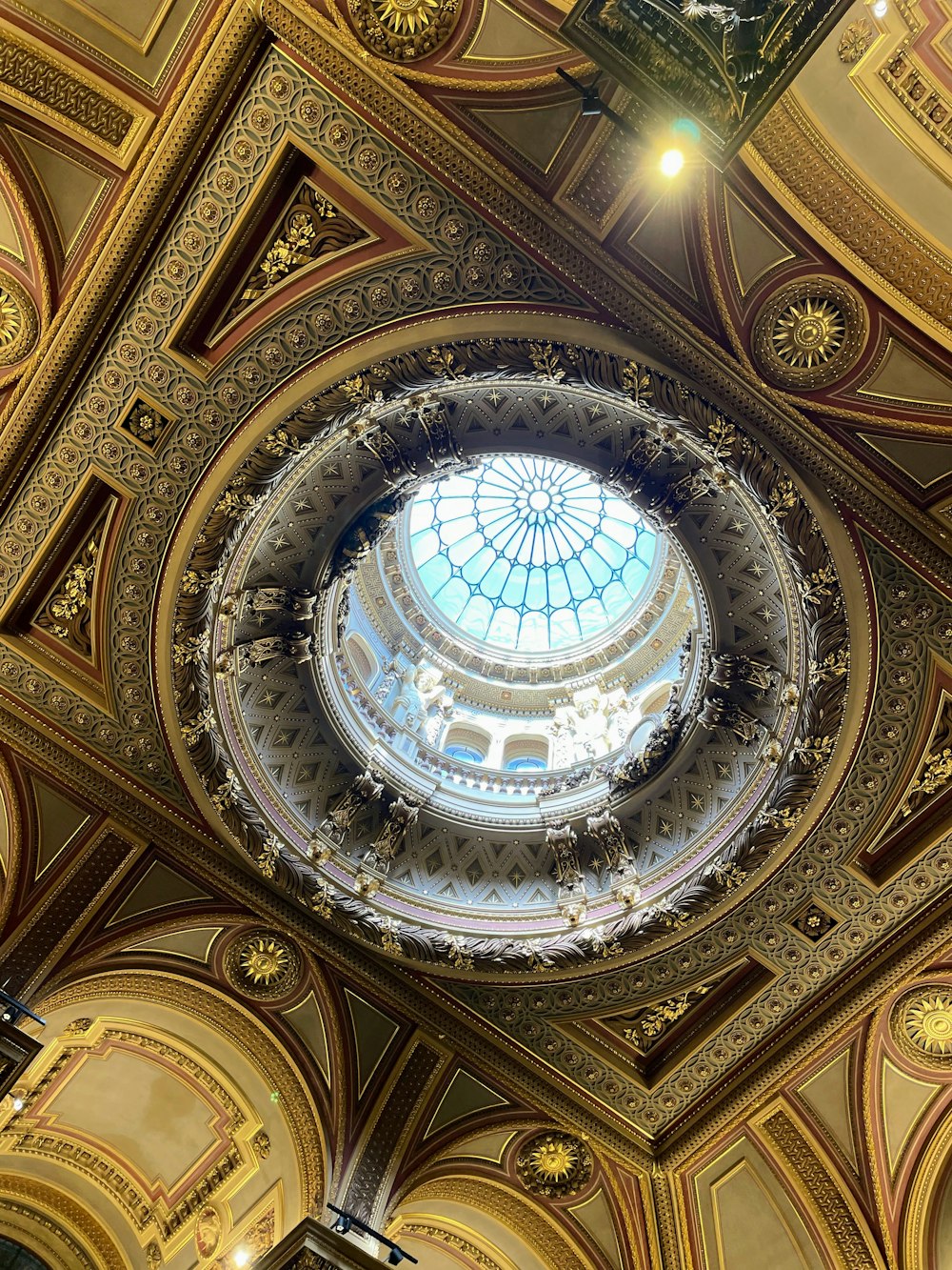 a domed ceiling with a large arched window