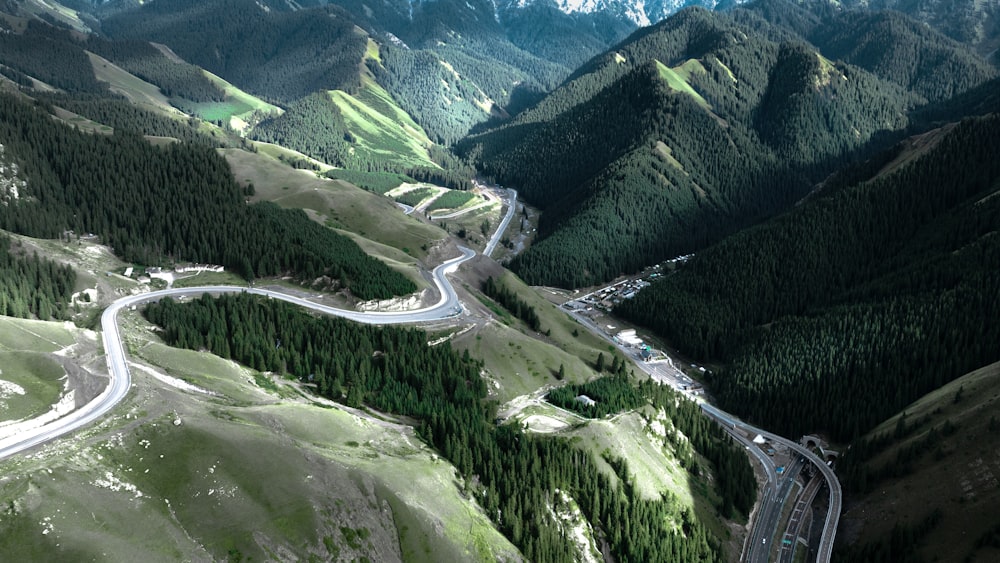 a winding road through a mountain