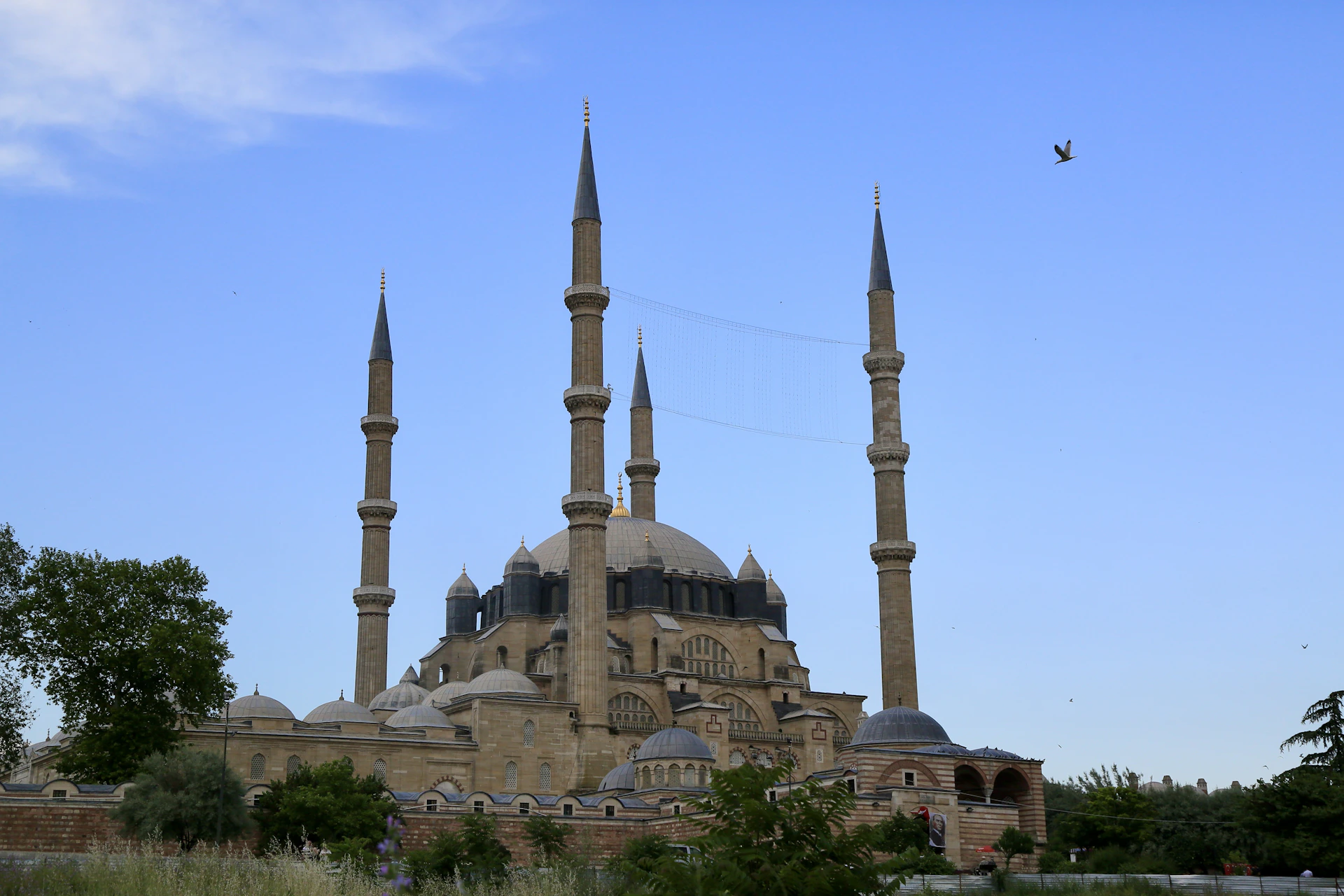 a large building with towers with Selimiye Mosque in the background