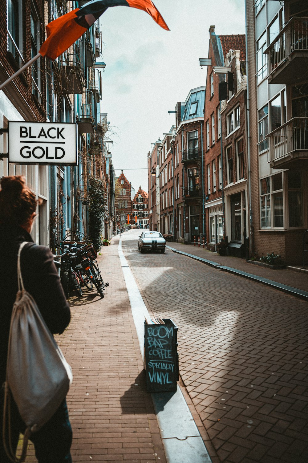 a person standing on a sidewalk