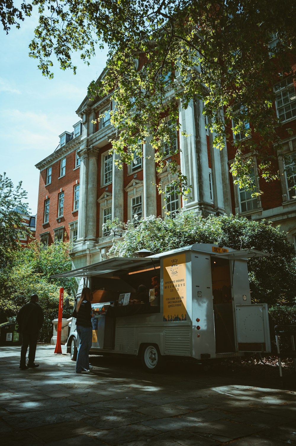 a truck parked in front of a building