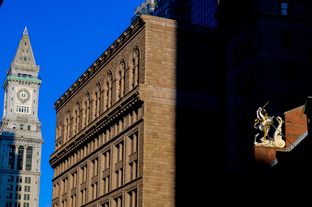 a clock tower next to a building