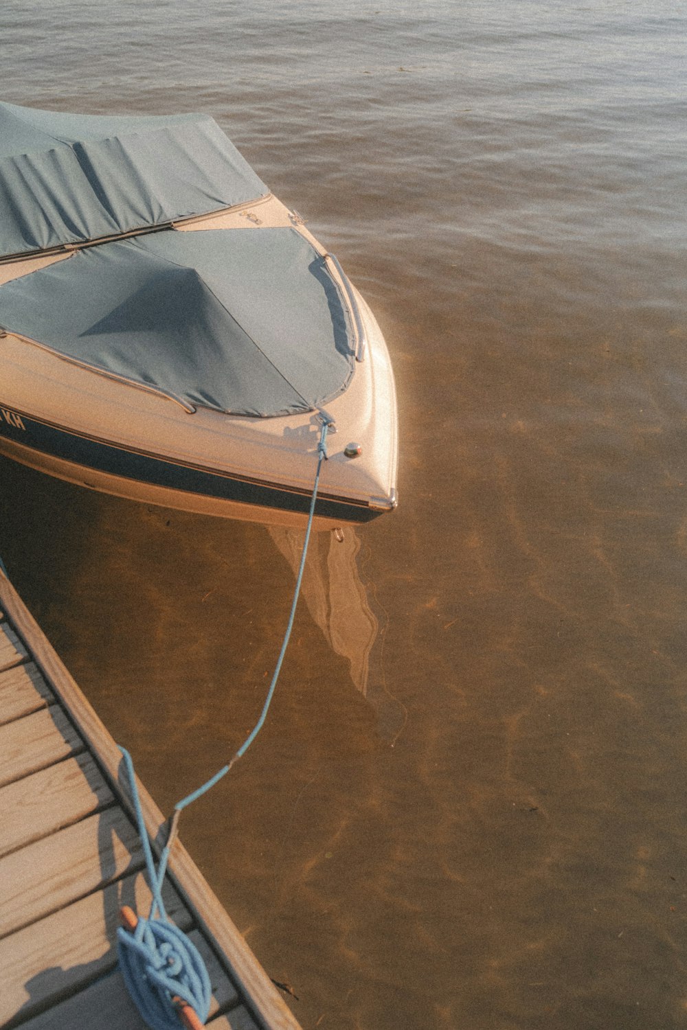 a boat tied to a dock