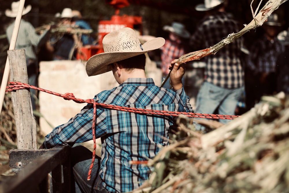 a person holding a stick