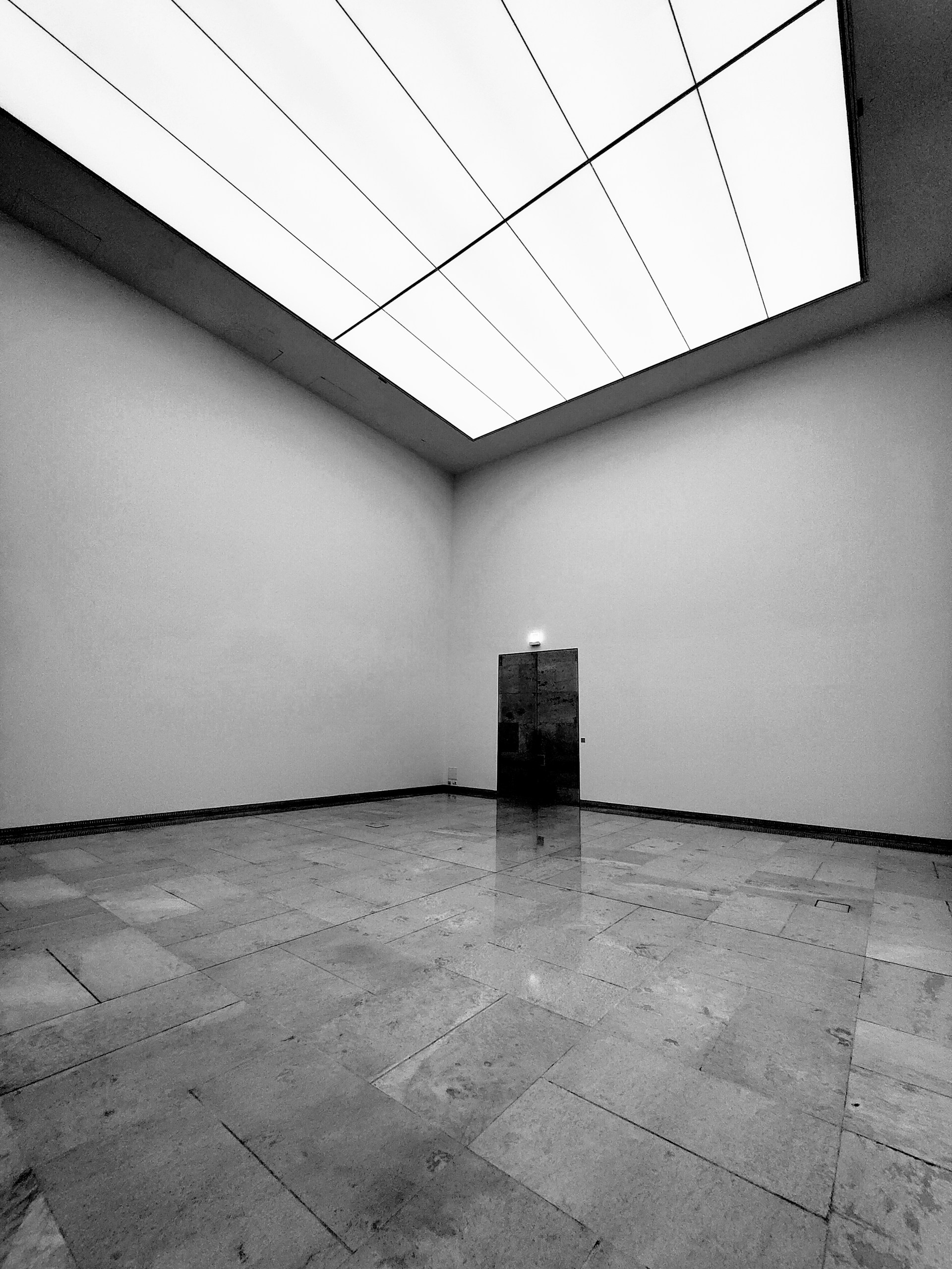 a room with a door and a window