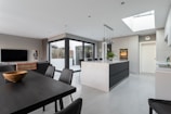 a kitchen with a dining table