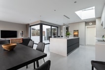 a kitchen with a dining table