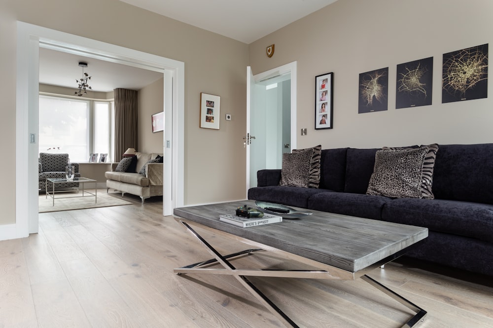 a living room with a couch and coffee table