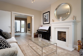 a living room with a fireplace