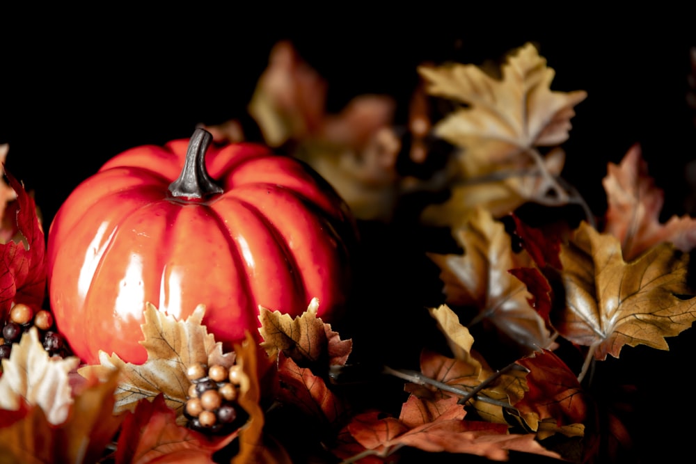 a red lantern with yellow leaves