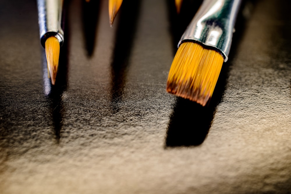 a close-up of a black and yellow pencil