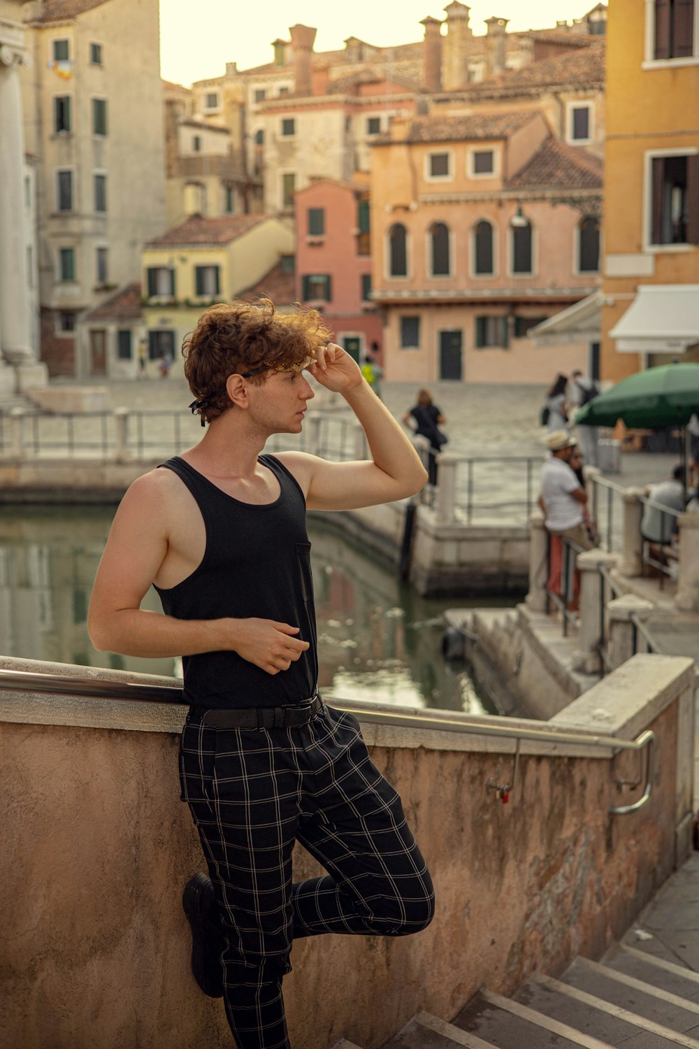 a person standing on a bridge