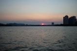 A scenic view of New York City skyline at sunset.