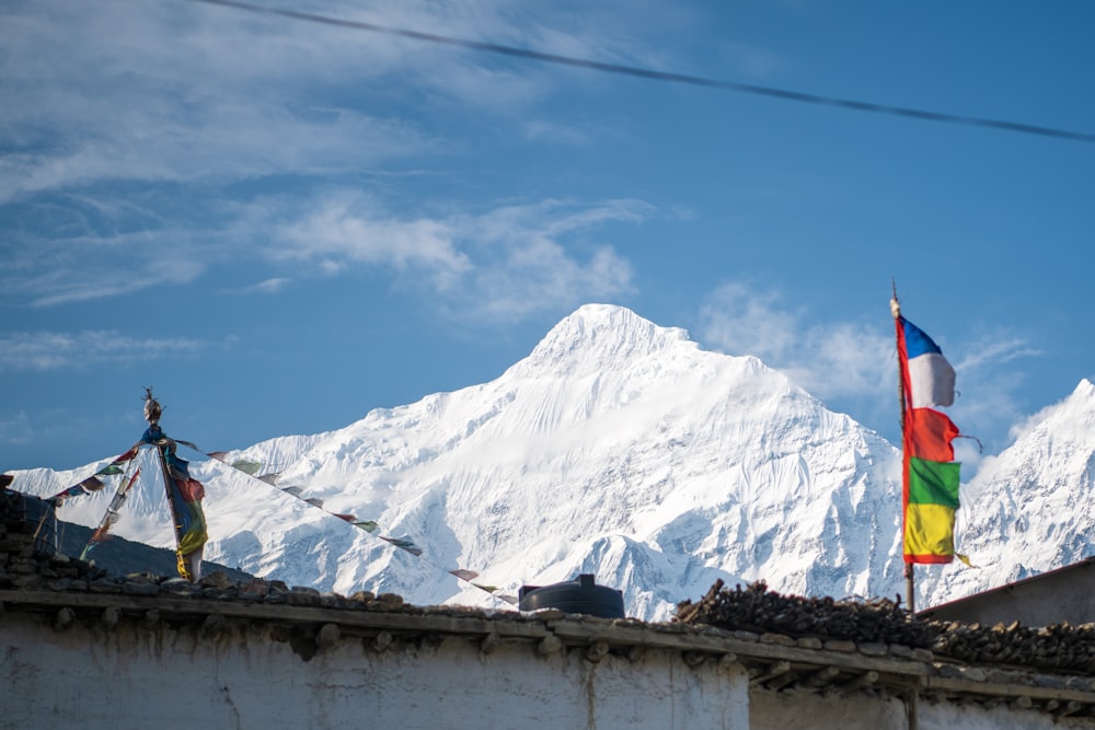 a mountain with flags