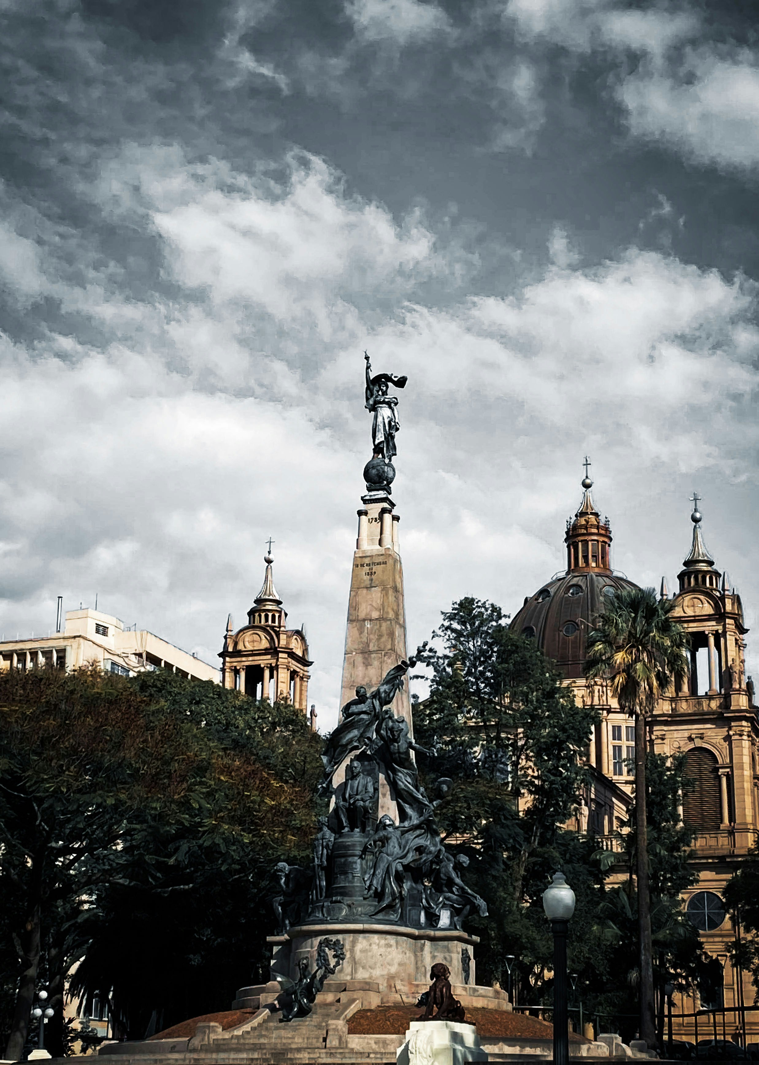 a statue in front of a building