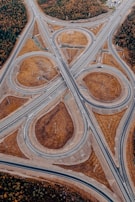 An aerial view of a complex road interchange showcasing precise design and layout.