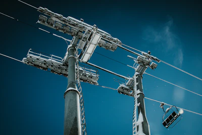 a tall antenna with a blue sky