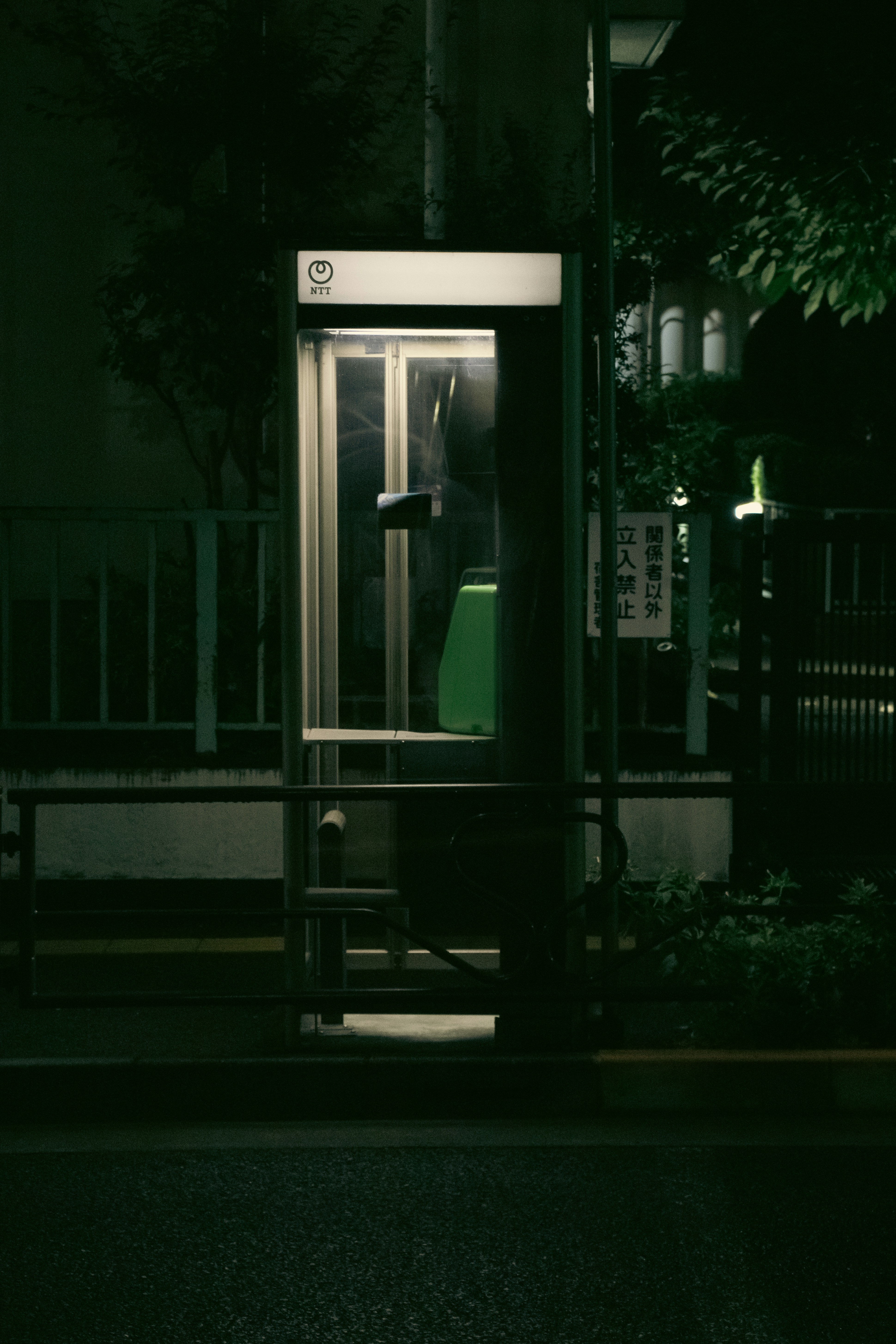 a phone booth on a street