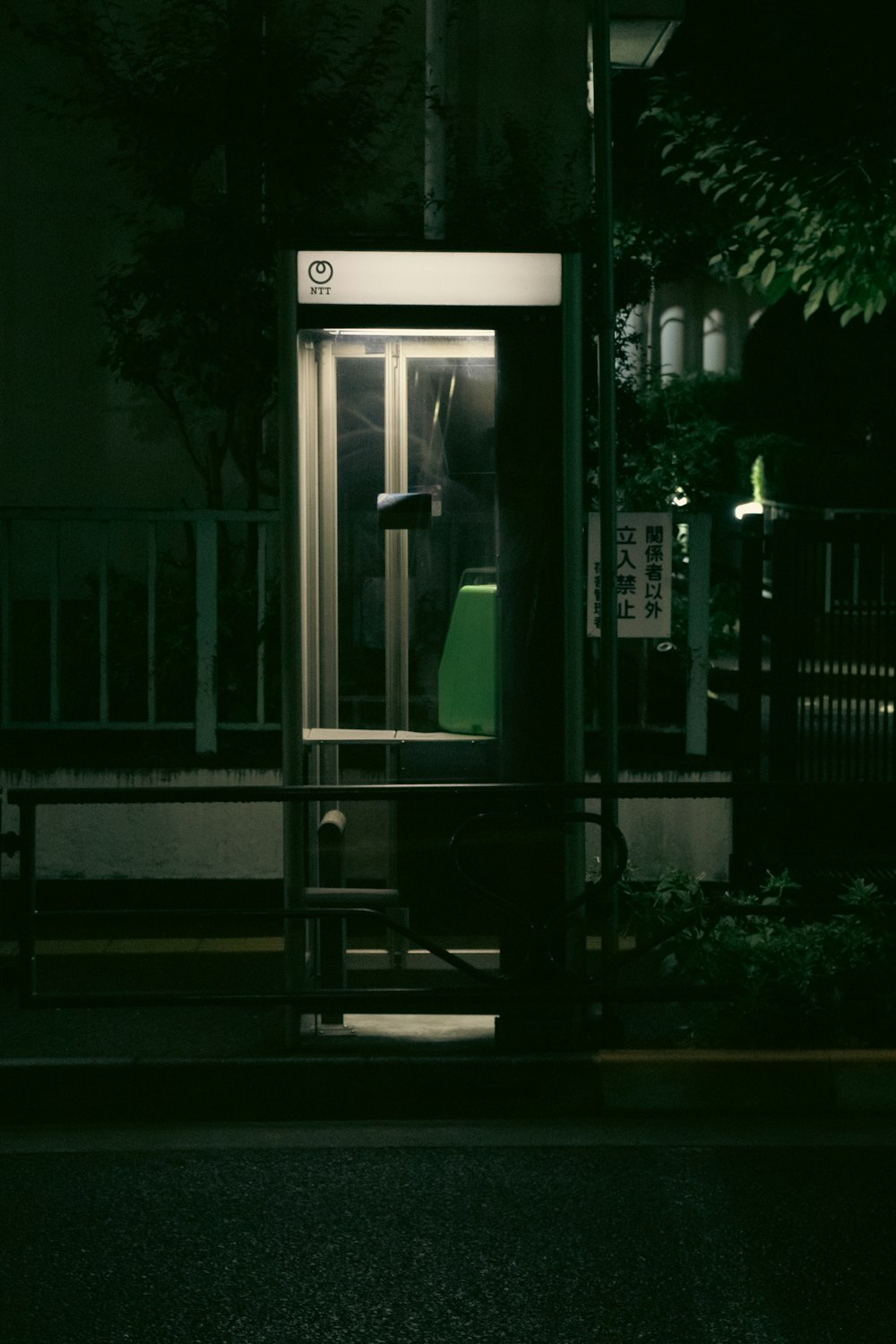 a phone booth on a street