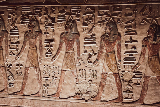 a group of people in ancient clothing