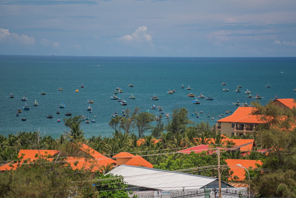 a body of water with boats in it and buildings around it