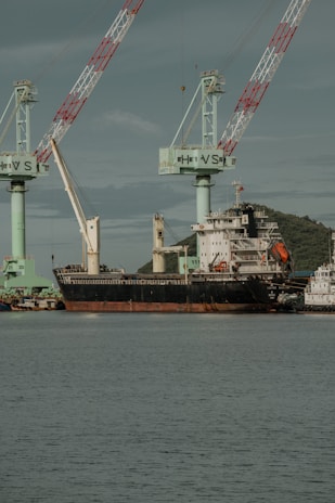 a large ship with cranes on it
