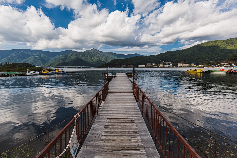 a wooden bridge over water