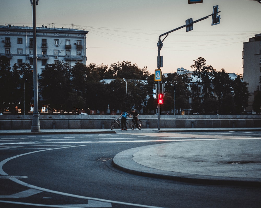 a person riding a bicycle on a street