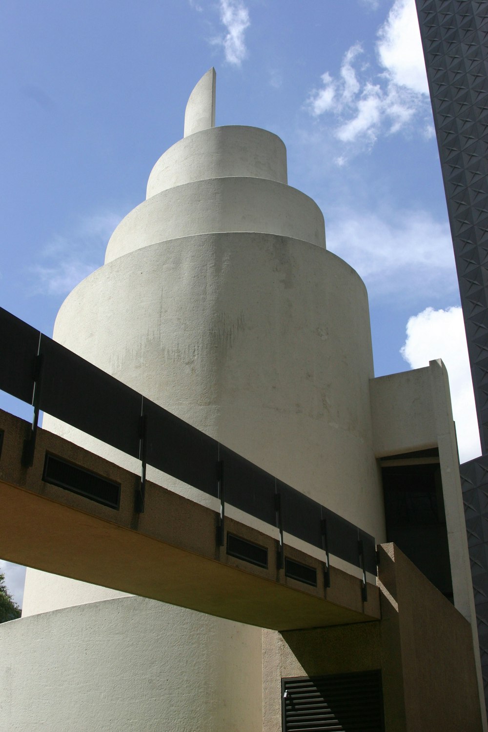 a building with a large cylindrical tower