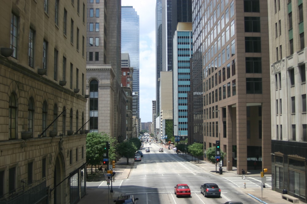 a street with cars and buildings on either side of it