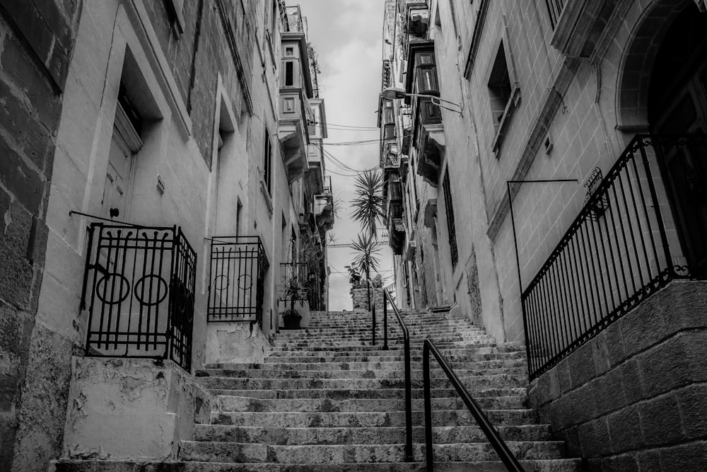 a stone staircase between two buildings