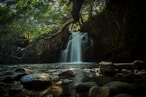 a waterfall in a forest
