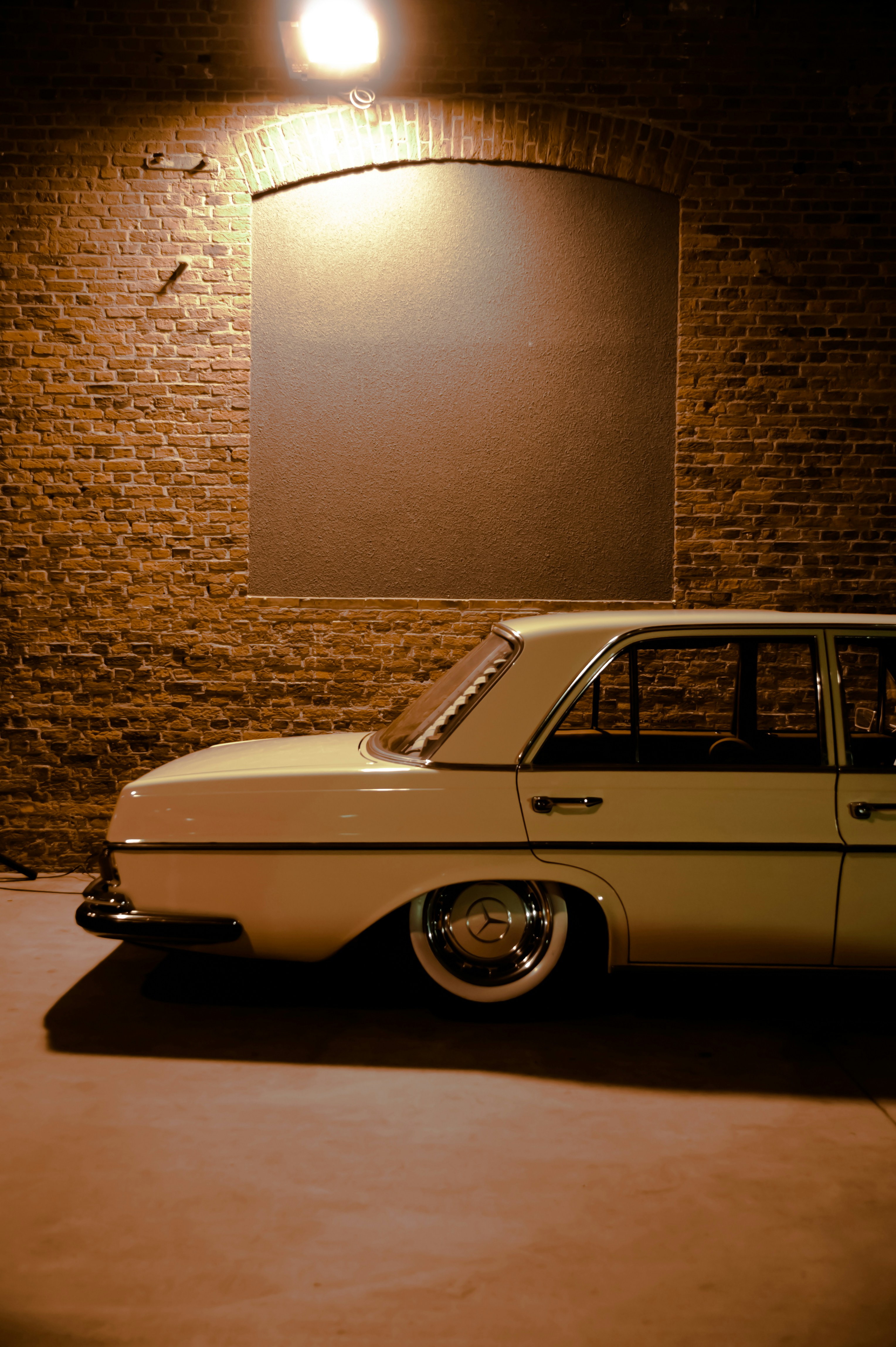 a car parked in a brick tunnel