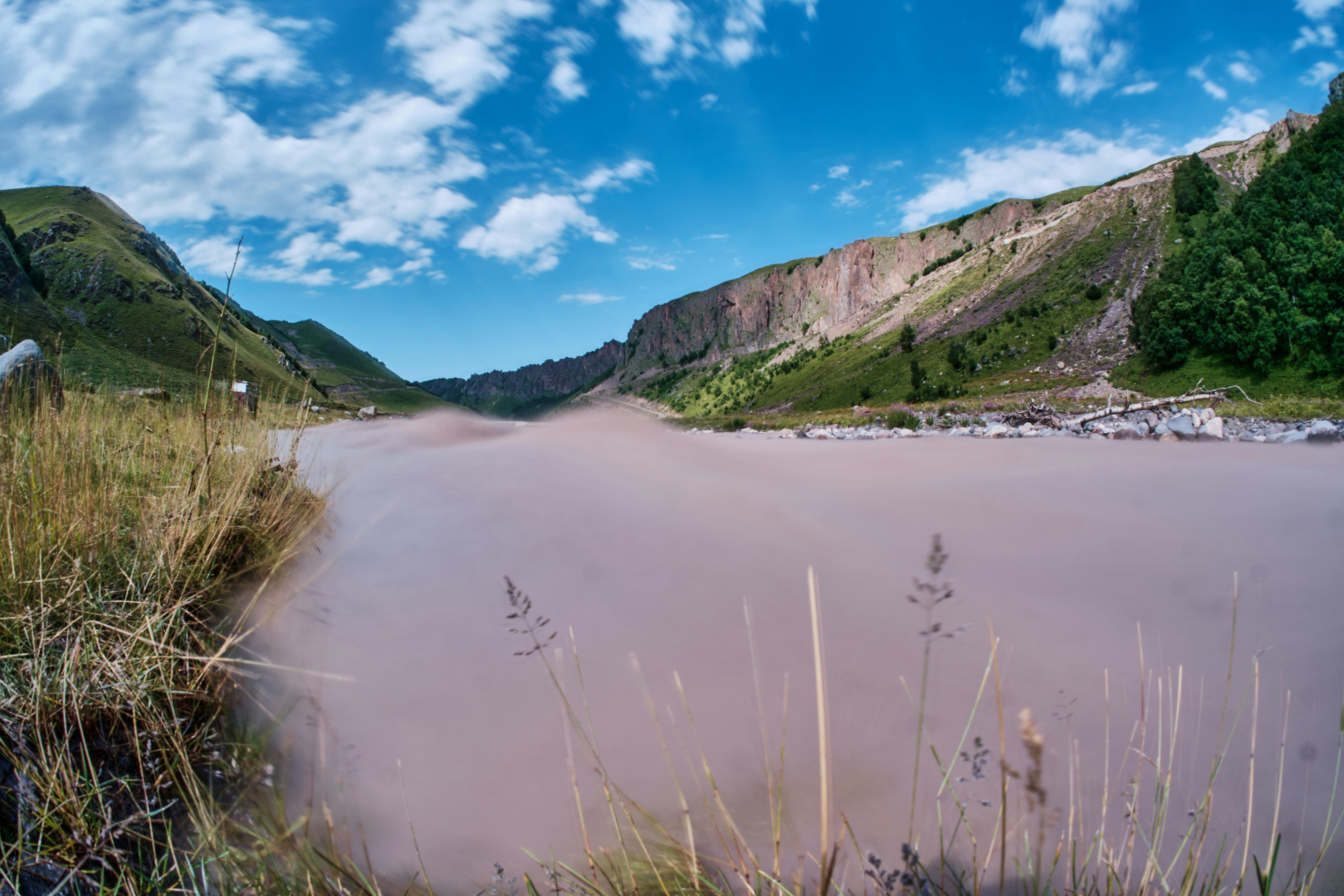 a body of water surrounded by mountains