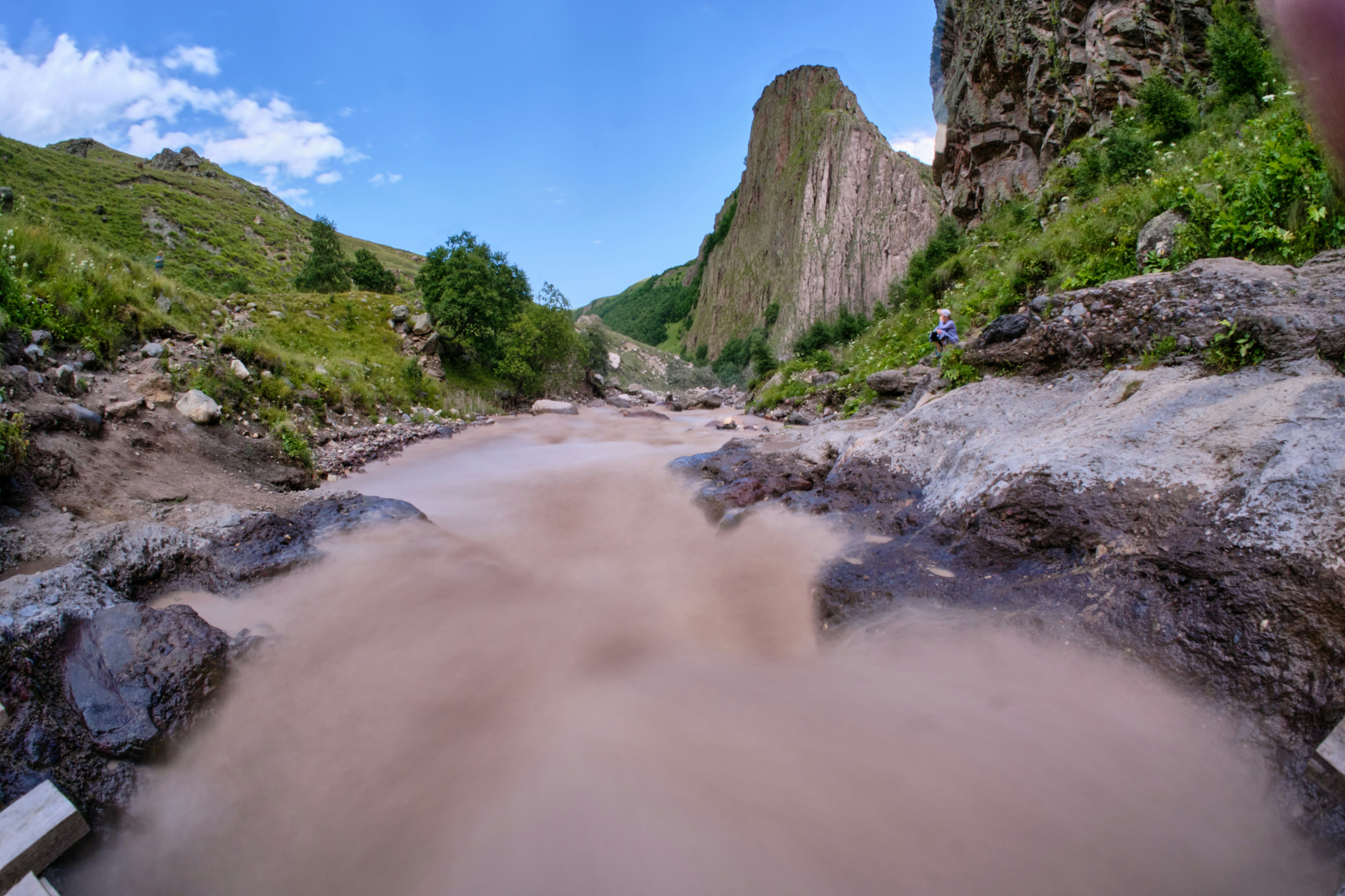 a river flowing through a rocky area