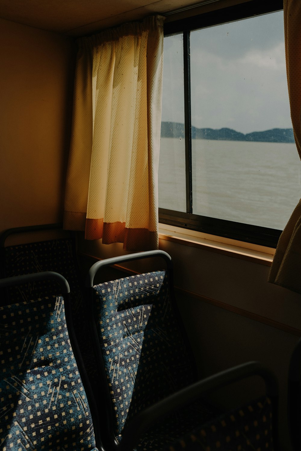 a row of chairs in a train