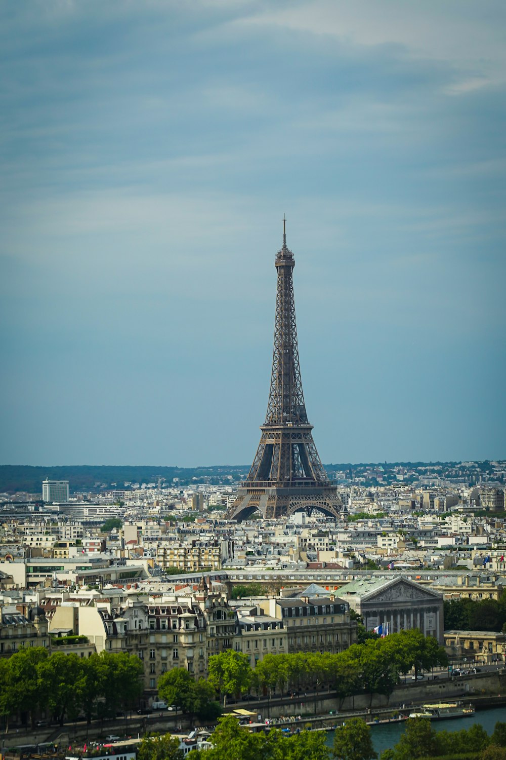 a tall metal tower in a city