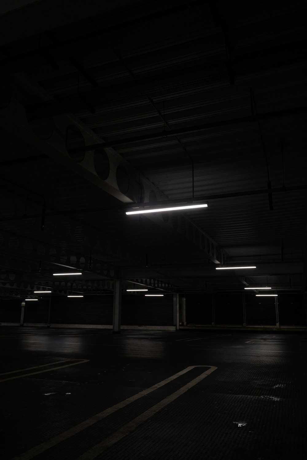 a dark empty parking garage