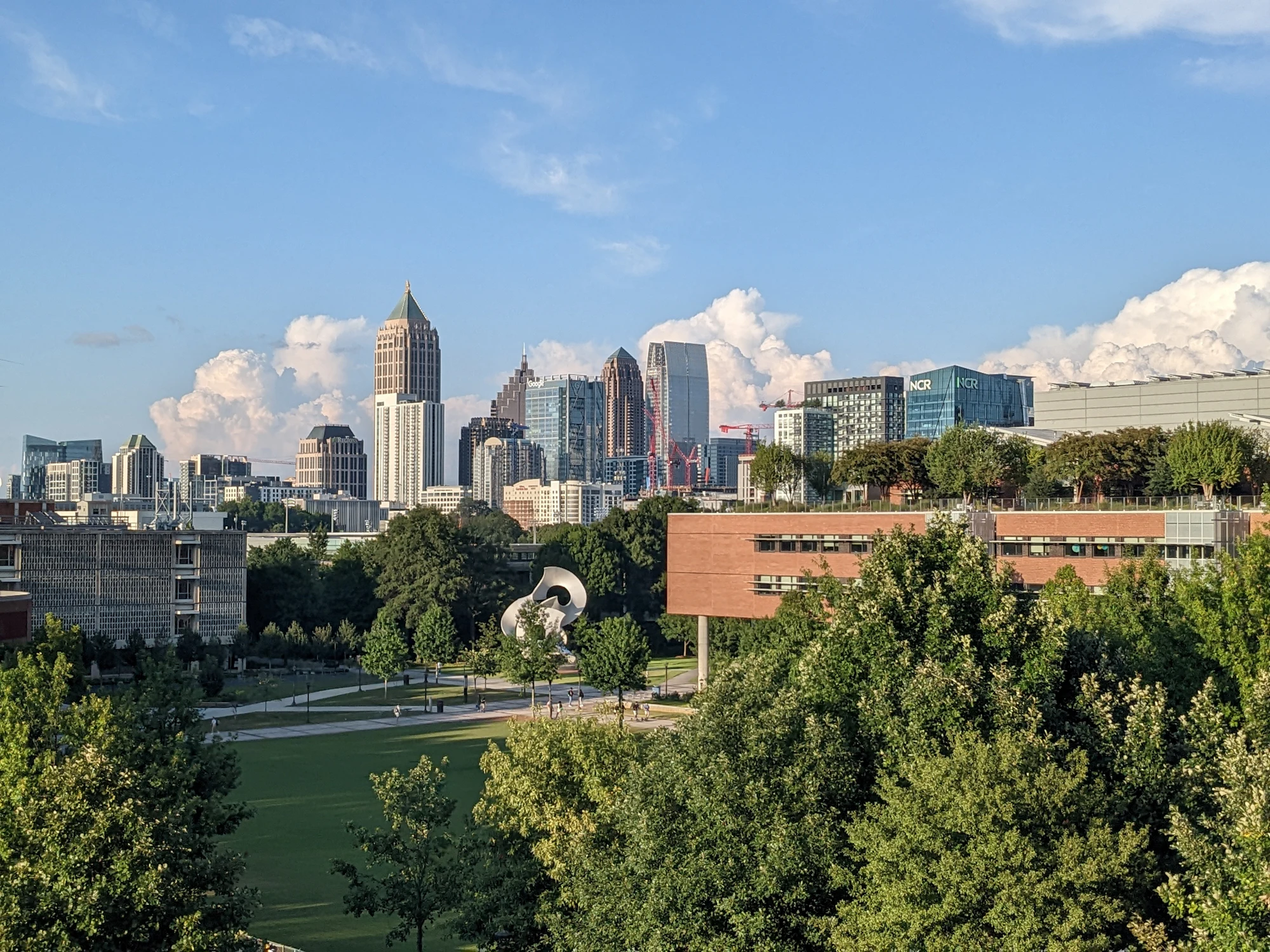 Atlanta skyline above a green park
