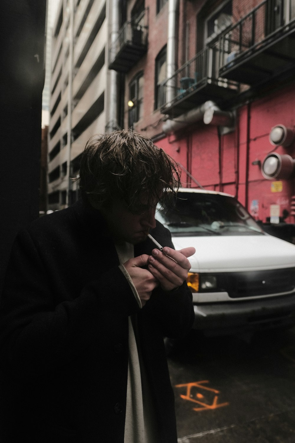 a man smoking a cigarette