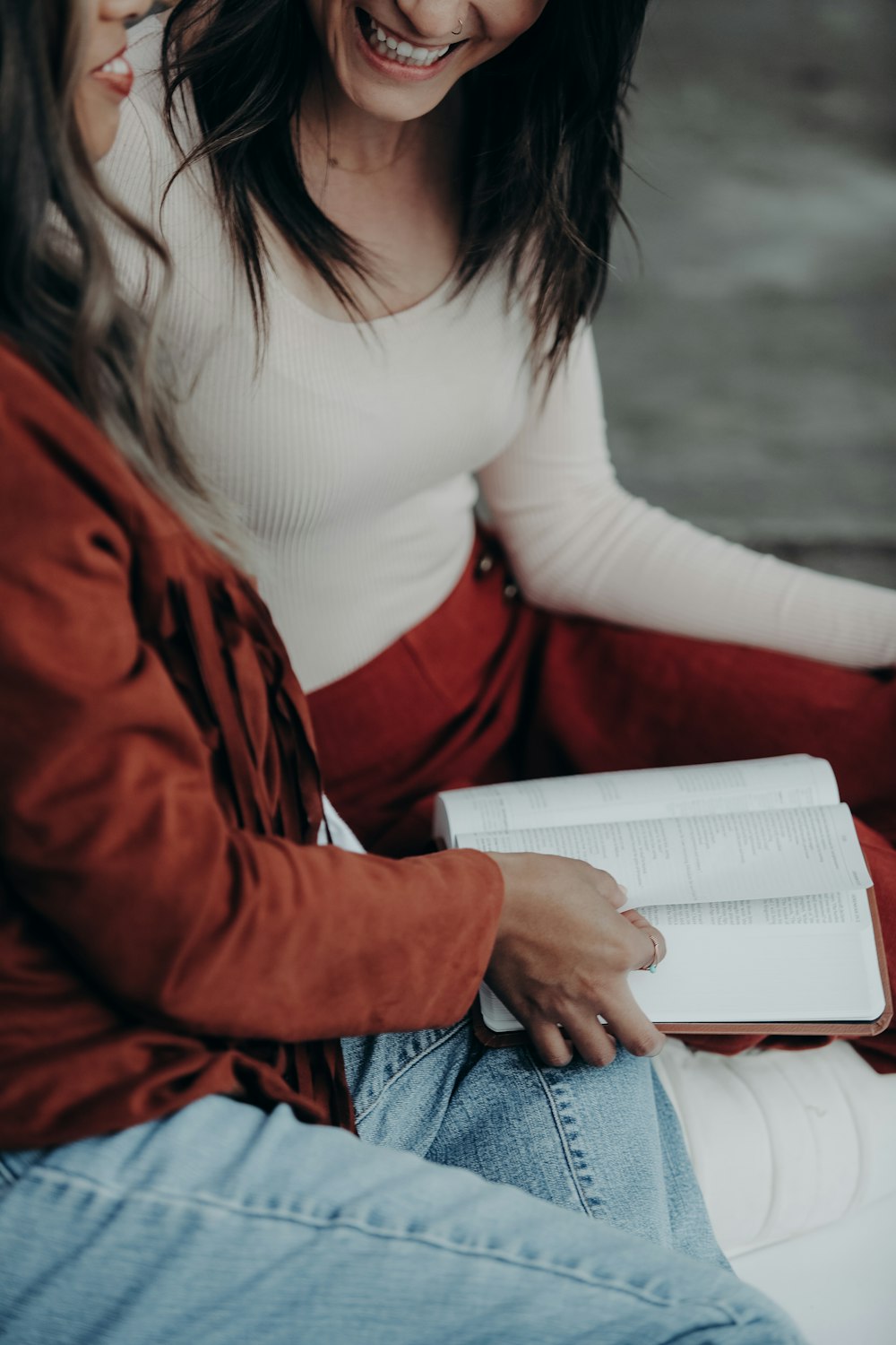 a woman holding a book