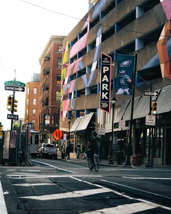 A street view of colorful murals celebrating Philadelphia's rich sports history.