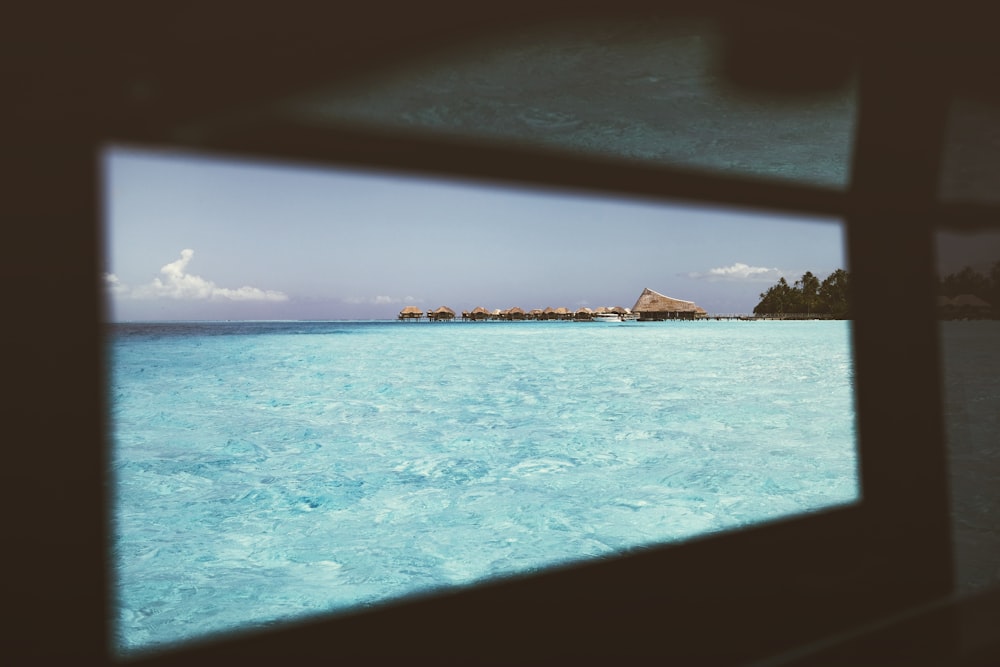 a view of the ocean from a window