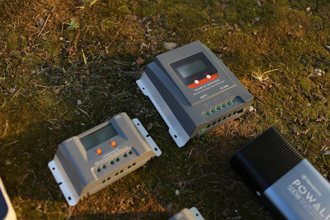 a couple of handheld game consoles