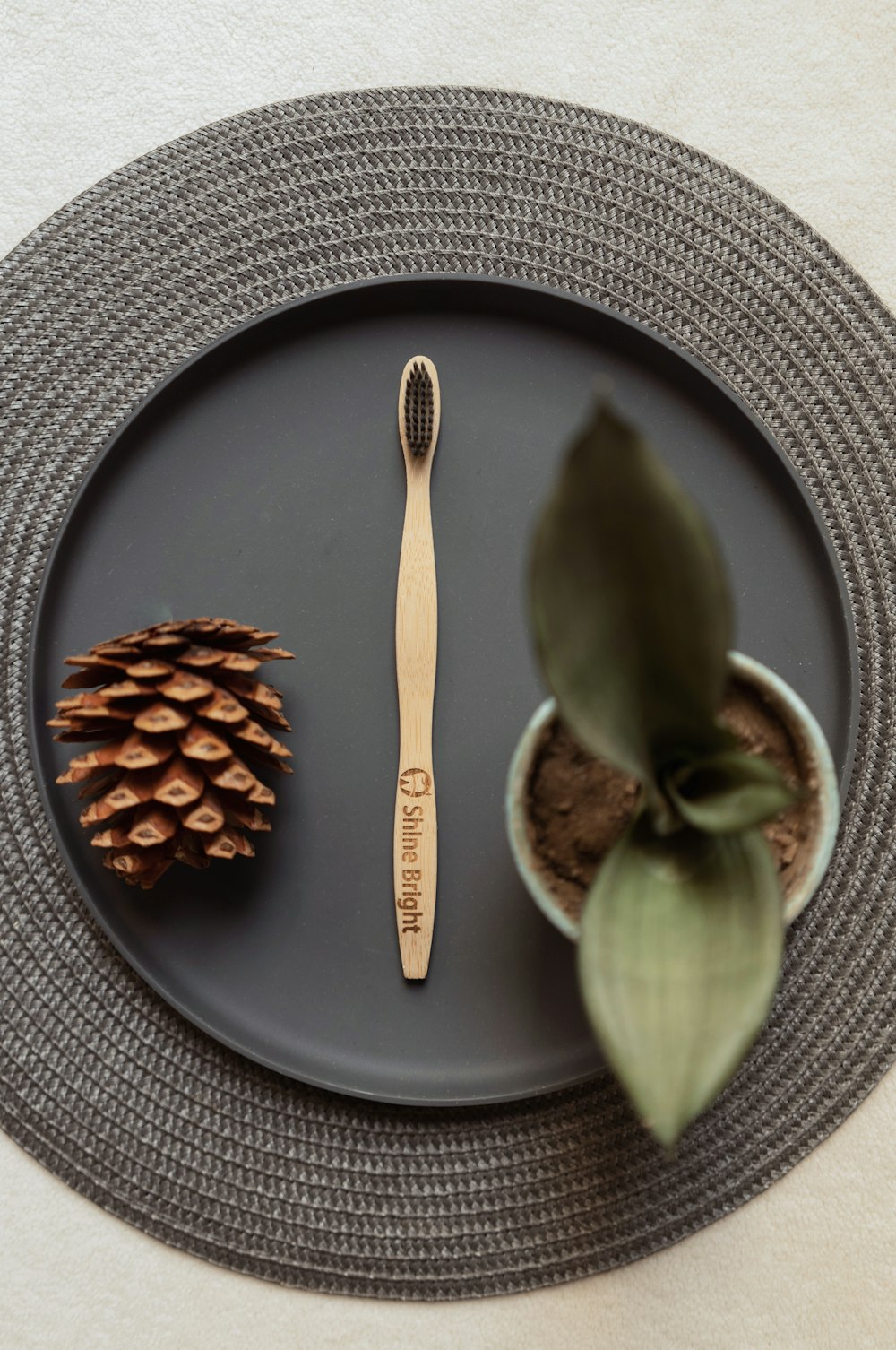 a plate with a spoon and a bowl of food