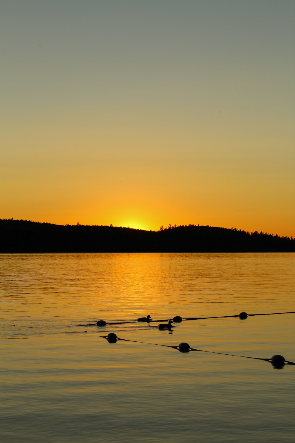 a sunset over a lake