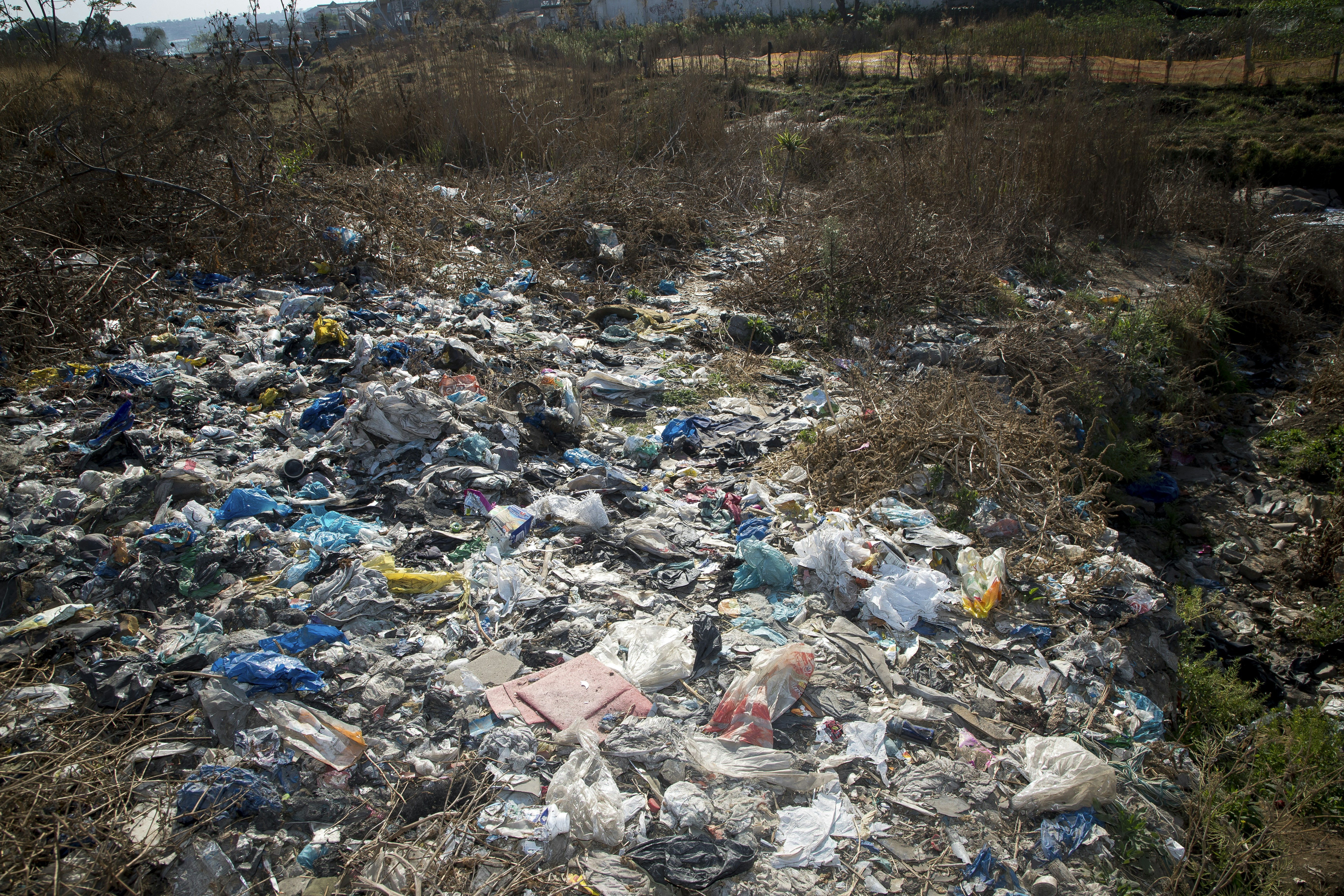 a dump site with trash