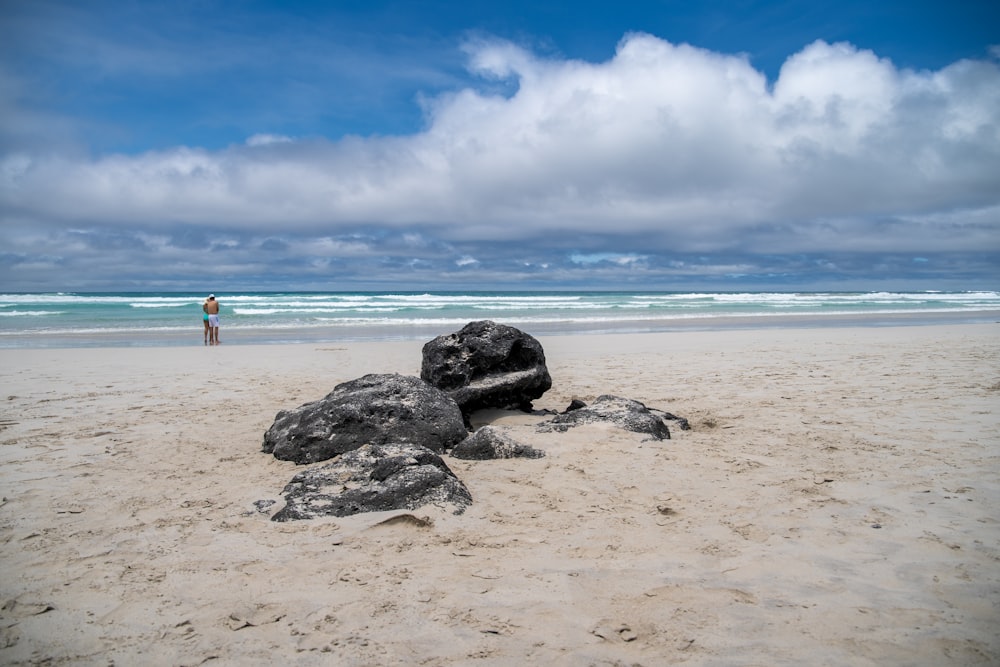 a person standing on a beach