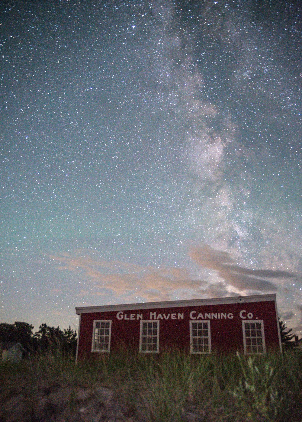 a house with a starry sky above it